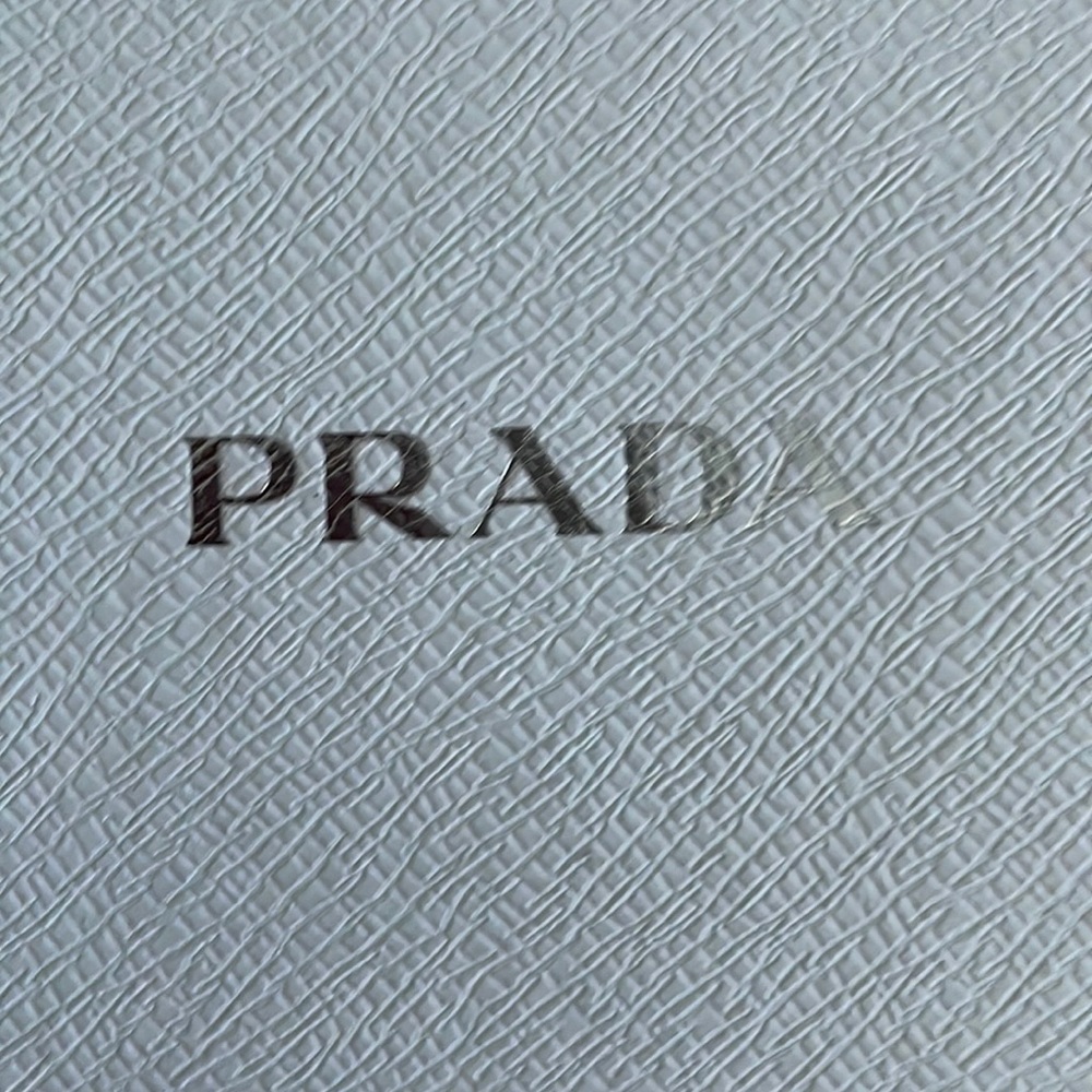 Prada sunglasses black gold rimmingGently worn, twice , since original purchase.